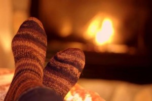 cozy socks by fire
